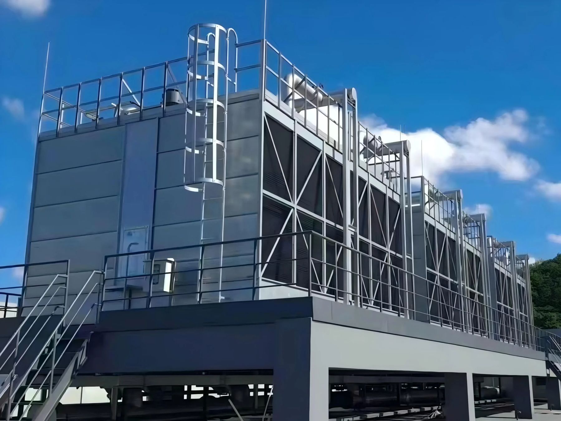 A bank of cooling towers on a raised steel platform